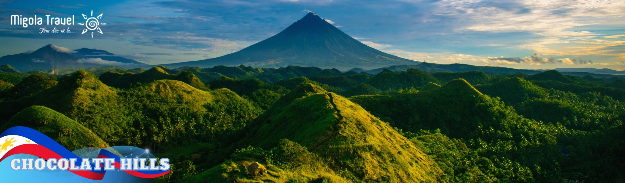 Chocolate Hills (Đồi Socola), quần thể gồm hơn 1.200 ngọn đồi hình nón hoàn hảo trải dài tít tắp. Vào mùa khô, thảm cỏ chuyển sang màu nâu sẫm, tạo nên một khung cảnh như hàng ngàn viên chocolate khổng lồ được sắp đặt bởi bàn tay tạo hóa